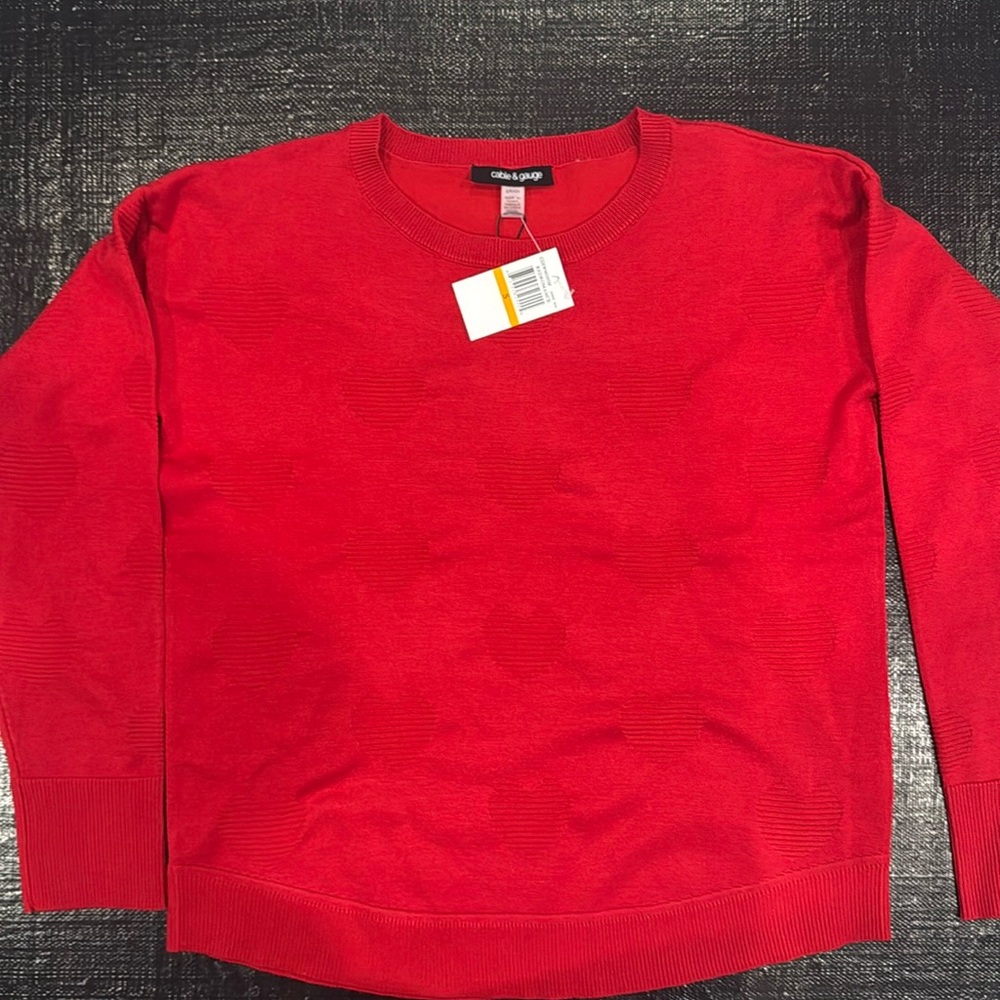 New with tags red crewneck with embossed hearts. Perfect for Valentine’s Day.